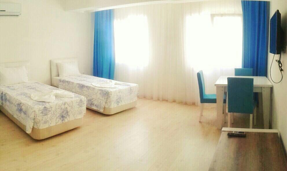 Mavi Butik Apart Кешме Экстерьер фото
